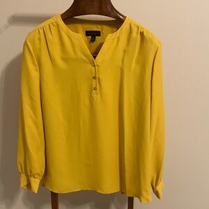 Investments Yellow Blouse
